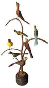 J212 Pennsylvania  signed and dated Daniel & Donna Strauser Folk Art Bird Tree  A Folk Art Carved Bird Tree by Dan Strawser 20th Century featuring seven carved and polychrome painted birds the underside is incised D+BS '77 height 21 1/2 inches