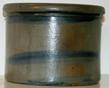 U44 An unusually small striper butter crock.with this simple, multiple stripe decoration, This small butter crock displays three freehand cobalt blue stripes. 6 1/2" diameter x 5" tall