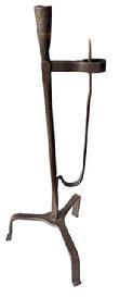 L251 18th century rare, non-adjustable hand forged Wrought Iron Rush Light with Candle Holder resting on tripod base. Unusual workmanship with arm being mortised through the stem. Circa 1750 1780. Great surface! Measurements: ~7 ½-8 across feet x 19 ¼ tall.