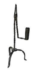 L408A 18th century rare diminutive American twisted wrought iron rush light / candle holder with arched tripod base resting on hand forged pointed feet. The candle holder acts as the counterbalance to hold the rush grips tight. Great original hand forged surface. Sturdy, sits level and is in wonderful working condition. Approximate measurements: 11" tall and is 4"-4 1/2" across feet, depending on where measured.