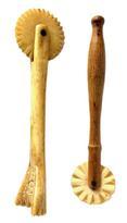 M24 Group of two (2) Sailor made Pie Crimpers with Scrimshaw Whalebone crimper wheels. One has a whale bone handle that is dated 1903 with the initials �J S� on the opposite side of handle and the second crimper has a delicately turned wood handle.  The solid whale bone one measures 5 &frac14;� long with a 1 &frac12;� diameter wheel. The one with wooden handle measures 5� long with the wheel being 1 &frac14;� diameter.  