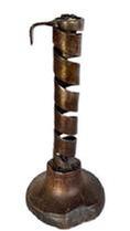 L408C Late 18th century � early 19th century Courting Candlestick constructed of spiraled forged iron with iron finger hold, mounted into a turned wooden base. Great original surface with dark patina to the wood. Approximate measurements: ~ 3 3/8� x 3 &frac12;� diameter base x ~8� tall.  