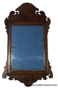 MS 5  1780-1795   Chippendale, Philadelphia Pennsylvania  origin  Looking Glass (mirror) scalloped crest and base,  mahogany wood, retaining it's original mirror plate, original back board.  Dated on back when it was restored in 1923