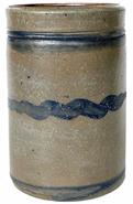 RM1292 Western Pennsylvania stoneware crock decorated with three squiggly lines, which is also known as a �Striper� crock. No chips or cracks. Measurements: 9 1/2� tall x 6 1/4� diameter (top) x 6� diameter (bottom)