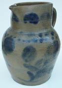 U229 Half gallon cobalt decorated, Stoneware Pitcher, ovoid Pitcher with tooled collared mid section decorated with flower and leaves, circa 1850 measurement are: 9" tall