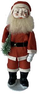 **SOLD** J194 Rare, absolutely mint - with original box - full bodied German Santa figurine holding a Tree. Composition material with felt clothing and natural beard/hair. Marked �Germany� on the bottom. Circa 1930�s. Measurements: Santa Claus stands 10 ¾� tall to the top of his hat. Circular base measures 2 ¾� diameter. The original box measures 12� long x 4 ½� wide x 3 ½� tall