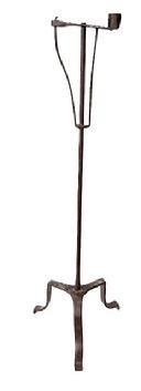 L207 18th century rare, non-adjustable hand forged Floor Standing Wrought Iron Rush Light with Candle Holder. Simple round stem with tall tripod base resting on hand forged uniquely shaped feet. Circa 1750 1780. Measurements: 5 ½ wide at candle socket x 10 across feet x 31 ½ tall.