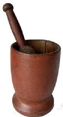 J270 Early 19th century Mortar and Pestle with original bittersweet red painted surface. Very simple turnings, with faint remnants of incised lines around the bowl and base areas.  Vertical open age crack along one side of bowl.