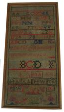 X14 Early 19th century American Sampler from Frederick Maryland, with great colors, with the Initials M.W and J.C. with a basket of flowers and two hearts and trees. Measurement are 8 7/8" x 17 7/8" long