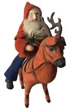 E513  20th Century Santa Riding a Reindeer Figure, candy container, felt cover, red jacket, blue trousers, 10"h.