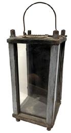 M271 Late 19th century Pennsylvania old blue painted wooden Lantern featuring three glass panels and a wooden panel with leather hinges contained within a wooden pinned and post construction frame resting on four short legs. Door opens freely to access the interior. There is a hole in the top for ventilation purposes which is covered on the exterior with a rusty old piece of punched / pierced sheet iron and the interior fitted with a large opening in the base and having a removable board which fits over the opening A wrought iron wire bail handle is attached to the top for carrying/hanging purposes. Measurements 6� square x 12 &frac14;� tall at corner posts. Overall height is approximately 15� tall including handle in upright position. 