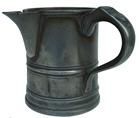 X58 Pewter Quart Measure, large pour spout, applied handle, molded footed base touch mark on the side crown with 31