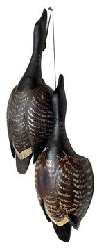 *SOLD* J336 Pair of full-sized hand carved wooden dead game hanging Brant birds. Original paint and great condition. Unknown carver. They measure about 19 ½� inches from the top of the tail to the tip of the bill x approximately 7 ¼� wide x 3 ¾� thick.