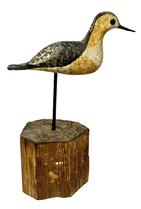 M215 Hand carved Shore Bird bearing glass eyes and its original hand painted surface. Mounted in a roughhewn solid wood base for display purposes. Unknown carver. Overall mounted height is 13 ¼ tall with the Bird measuring 8 ½ long x 1 ¾ wide x 4 tall.
