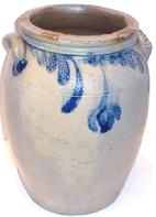 Unsigned approximate 13 5/8 tall crock with blue leaf floral decoration,all around.