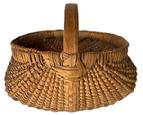 K1845 Late 19th century Pennsylvania Melon Basket of ribbed and woven oak splint construction. Natural patina surface. Great condition. Approximate Measurements: 8 ½ long x 7 wide x 6 tall with handle.  