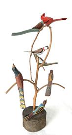 F487 Folk Art Pennsylvania hand carved Bird Tree dated 1987 and signed DS with seven  birds, mounted on a round base. The Folk Art carver is Daniel Stawser, from Pennsylvania Measures  22 ½� tall