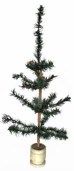 U130 Early German Feather Tree - goose feathers on wire limbs secured in an original white painted wooden base.  Base measures 3 ¼� tall x 2 ¾� diameter. Stands approximately 25 ½� tall overall.