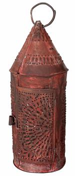 H992 19th century punched tin Lantern, with beautiful dry red painted surface. Symmetrically punched and pierced patterns of dots and dashes, with punched and pierced designs in conical top for venting purposes. Hinged door opens for easy access to interior candle socket. Attached round metal handle at the top for carrying / hanging. Measurements: 14� tall (not including ring) x 5 ½� diameter. The ring measures 2� diameter.