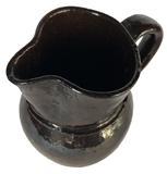 E415 19th century Miniature -glazed Red ware pitcher, with dark brown glaze. 