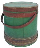 U387 Sugar Bucket /firkin with the original red and green paint tongue and groove staves, tapered lap joint wooden bands  held in place with copper tacks. Bent wood handle with wooden pegs.12" tall x 11" diameter top