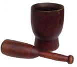 Z396  Early painted mortar and pestle, It is thick walled, with a nicely turned base,     The pestle, which appears to be original to the mortar,.  Excellent condition -   Wonderful form. Old red paint, 6.5"high.,