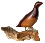 K298 Signed and dated hand carved Shore Bird with Earl M. Brinton and 1979 Cherry inscribed on the underside of the birds tail area.  Beautiful solid cherry wood carving is mounted on a piece of driftwood for display purposes. Bird measures approximately 8 long x 2 ½ wide. The driftwood is approximately 7 ¾ long x 4 ¼ wide. Overall mounted height is approximately 8 tall.  