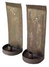 L436 Pair of Hanging tin wall sconces, each with a canted and crimped edge along the tops of their squared backs, embossed reeded columns, finely folded edges, a drilled hole for hanging and a demilune dish holding a single rolled edge candle socket that is 1 ½ tall. Solder joints are secure. Sconces retain their untouched natural patina surfaces. Measurements: 11¾ tall x 4 ¾ wide x 3½ deep.