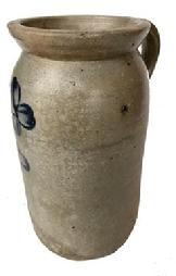 G148  19th century 1 gallon blue decorated stoneware butter churn, Baltimore, MD circa 1850-70.  Single handle and bold double flowers on front  The crock stands  10" tall