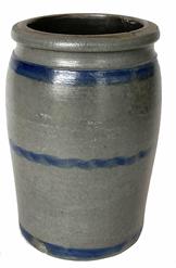 G773 19th century Baltimore Striper crock with wide, flat topped, wax sealer rim that tapers to tooled shoulders and down to straight sides and a cylindrical bottom. Nicely decorated with three prominent cobalt blue stripes. Slightly tilted across top.  No cracks evident, however there is a chip along bottom edge as seen in photos within lowest stripe.  Measurements: 10" tall x 6" diameter