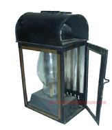 K180 This is a wonderful Oil Lantern, with what appears to be the original black and gold paint, possibly a Carriage lantern. The oil burning pot is separate and sits inside the enclosed lantern.  There is glass on 3 of sides, with tin in the back, a bracket on the back of the Lantern is for holding it in place