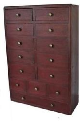 C585 19th century fourteen drawer Apothecary / spice Chest with red paint, the drawers are nail construction with square head nails, the wood is walnut and pine , beautiful pine back boards circa 1840 