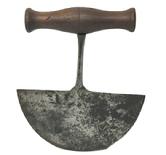 M1164A 18th century Steel Food Chopper with wooden handle. Marked "BRADES CO" on stem. Circa late 1780s -1800. Measurements: 6 3/16" wide x 7 1/4" tall.