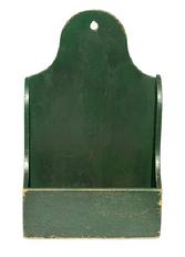 M1167 Late 19th century New England wall box featuring shaped sides and a high arched back with hole for hanging bearing its old green painted surface. Small wire nail construction.