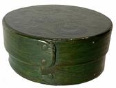 G840 Exceptional small round green painted pantry box paint decorated with �G.W.� on top. Steamed and bent overlapping sides secured with small copper tacks and tiny wooden pegs. Measurements: 1 3/8" tall x 3" top diameter