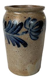 K1741 19th century cobalt blue decorated Stoneware Jar attributed to Peter Hermann of Baltimore, Maryland.  Beautiful hand painted heave cobalt blue flowers encircle the tall, cylindrical form with flat bottom, tooled shoulder, and slightly flared, flat-topped rim. Great condition. Peter Hermanns pottery was on Edger Street in Baltimore from 1850-1872.  Measurements: 4 ¾ top diameter x 5 1/8 bottom diameter x 8 ¾ tall. 