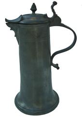 T219th Century  Pewter Flagon one of the most rare types of pewter, (A large vessel, usually of metal or pottery, with a handle and spout and often a lid, used for holding wine or other liquors)  makers mark on the handle and a floral design on the inside of the bottom. Initials on the front of the flagon WBW Measurements 12&quot; tall are