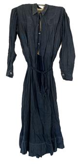 (i316) Late 19th century Womans Indigo Blue cotton dress with lined bodice and pearl buttons. This simple working dress shows extensive make-do repairs that were done with various indigo blue calico print fabrics  a true sign that this dress was used regularly, and for a long period of time. Circa 1860s-1880s. 