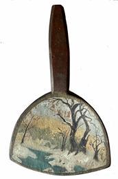H484 � 19th century hand painted wooden butter paddle depicting a snowy landscape scene with barren trees alongside an icy body of water with faint outlines of snow-covered roofs of houses in the background. 