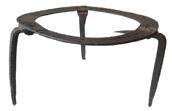 *SOLD* J337 18th century hand forged cast iron fireplace post stand / trivet. A fine example of a blacksmith made cooking trivet. Trivets such as this were used for a variety of purposes at the hands of a hearth attendee. The piece allowed for any type of pot or pan to be elevated to keep a distance from hot coals for cooking purposes. Measurements: 13 ¼� diameter x 8� tall
