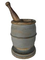 **SOLD** K83 19th century Pennsylvania mortar and pestle bearing original, dry blue-gray painted surface. Nicely turned solid wood with rounded rim and decorative raised rings encircling the mortar, resting on a footed base. The pestle has a gracefully shaped turned handle with bulbous end that shows extensive wear from years of use. Natural patina interior. No cracks. 