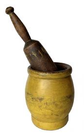 RM1443 Early 19th century Mortar and Pestle with original vibrant yellow painted surface. Very simple turnings. Good condition - with a few minor surface cracks that do not go completely through, and nice wear from years of use. Dark natural patina interior. Measurements: 4 3/4" top diameter x 4 1/4" bottom diameter x 6 1/2" tall. Pestle measures 11" long. 