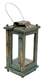 M270 19th century Pennsylvania signed original blue painted wooden Lantern featuring four bubbled glass panels contained within a wooden pinned and post construction frame. The initials "FH" are punched into the underside of the lantern. A wire bale handle is attached to the top for carrying/hanging purposes.