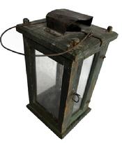 M270 19th century Pennsylvania signed original green painted wooden Lantern featuring four bubbled glass panels (small crack in the corner of one panel) contained within a wooden pinned and post construction frame. The initials "FH" are punched into the underside of the lantern. The door to access the interior candle socket is attached with tiny wire hinges and secured with a tiny wire loop and latch. There is a hole in the top for ventilation purposes which is covered on the exterior with a curved piece of sheet metal to create a hood that protects the candle flame from wind/rain. A wire bale handle is attached to the top for carrying/hanging purposes with one handle attachment that comes loose due to a large age/heat separation in the wooden top. Circa mid-1800s. From an estate in Chambersburg, PA. Measurements: 4 ¾ x 5 square x ~9 ¾ tall not including handle.