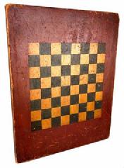 H207 19th century outstanding original painted checkers game board shows an outstanding original painted wood surface and is constructed from a single wide pine plank.
