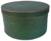 X75 19th century original green painted Pantry Box, wonderful dry surface, excellent condition, top of lid stamped: "S. Pace." 5 3/8"h. X 10"dia. Condition: Good with little use wear.