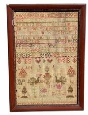 G353 Exquisite Family sampler wrought by �Charlotte Smith, FEB 1829� This remarkable Sampler features two dates (1828 and 1829), bands with four full sets of repeating Alphabets, a band of numbers 1 - 20, as well as spot motifs that include multiple hearts, flowers, a very detailed cat, bowl of fruit, chickens, peacocks, trees, a crown.... and an astounding 46 sets of initials!