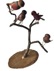 VD332 New England  Folk Art Bird Tree  with four Polychrome Birds  resting on a branch the base  is birch  this piece of folk art is Unsigned and it stands   11 1/2" tall