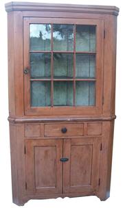 W328 Hagerstown, Maryland  19th century  Two pc Corner Cupboard with nine window lites, , original rare salmon paint on the exterior, with the original white wash on the interior, dovetailed  center drawer,  applied  molding  with two panel lower doors, with interior shelves , nice high cut out foot with a center drop in the apron,   79" tall x 30" corner