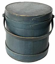 J81 Original dark blue painted lidded firkin with tongue and groove softwood staved sides secured with tapered lap joint wood bands held in place with small tacks. Wooden swing handle attached by large buttonhead wooden pins. Very clean, natural patina interior. Measurements: 8 5/8" top diameter x 9" tall